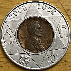 Encased 1948 D with six pointed star Good Luck