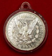 Obverse Morgan encased silver dollar